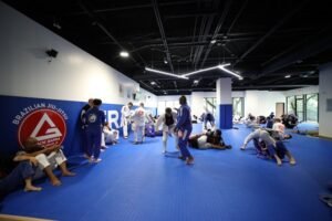 Women in jiu-jitsu overcoming challenges with technique and confidence